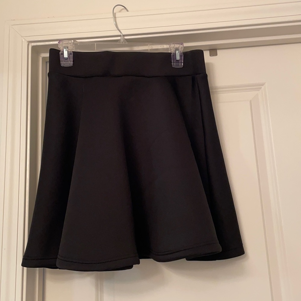 2 piece black top and skirt.